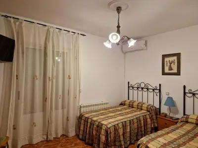 Cama o camas de una habitación en Casa Rural La Malena