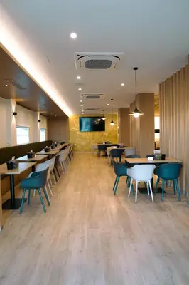 Zona de estar de Hospedium Hotel Triana
