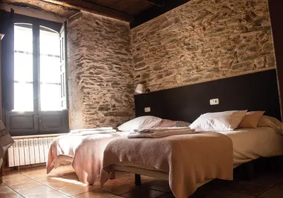 Cama o camas de una habitación en Casa Rural La Torrecilla con PISCINA PRIVADA