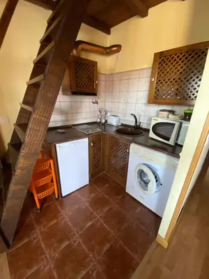 Una cocina o zona de cocina en Apartamentos Rurales La Antigua Fonda