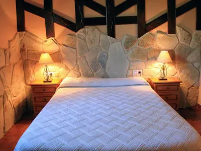 Cama o camas de una habitación en Complejo Turístico Las Cañadas Casas de Campo- Actividades Gratuitas Todos los Fines de Semana