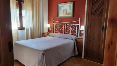 Cama o camas de una habitación en Apartamentos Rurales La Platea