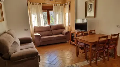 Zona de estar de Apartamentos Rurales La Platea