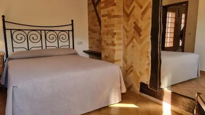 Cama o camas de una habitación en Apartamentos Rurales La Platea