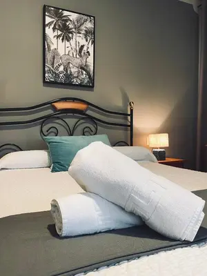 Cama o camas de una habitación en Hostal Paulino