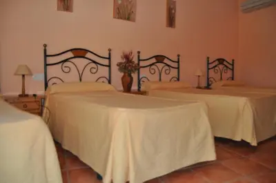 Cama o camas de una habitación en Hostal Paulino