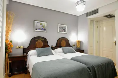 Cama o camas de una habitación en Hospedium Plaza Mayor Salamanca