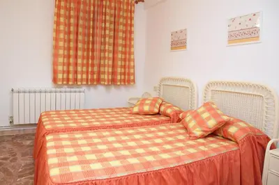 Cama o camas de una habitación en La Hojarasca