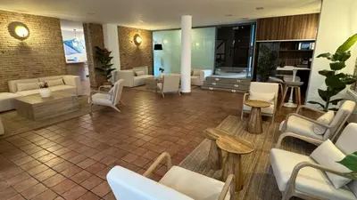 Zona de estar de Hospedium Hotel La Fuente