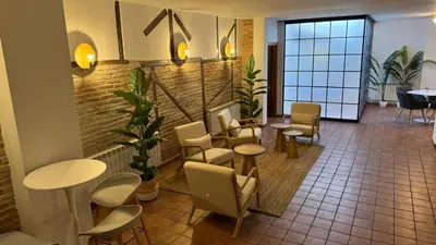 Zona de estar de Hospedium Hotel La Fuente