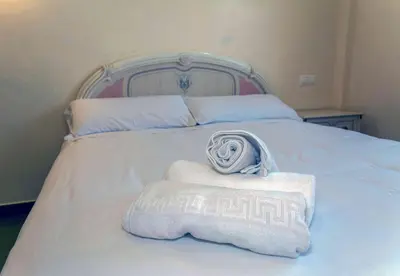 Cama o camas de una habitación en LA COCHERA