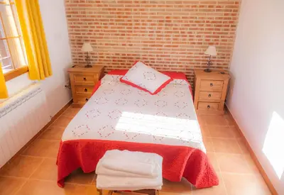 Cama o camas de una habitación en Casa Los 5 Caños