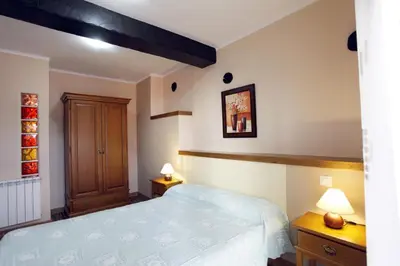 Cama o camas de una habitación en Apartamentos Hervasypunto