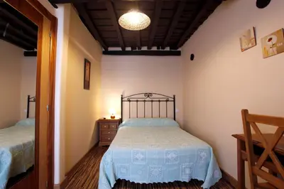 Cama o camas de una habitación en Apartamentos Hervasypunto