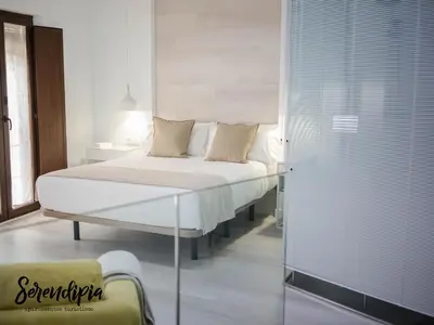 Cama o camas de una habitación en Serendipia San Justo