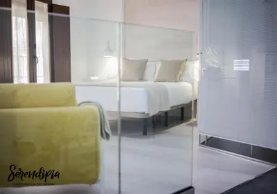 Cama o camas de una habitación en Serendipia San Justo