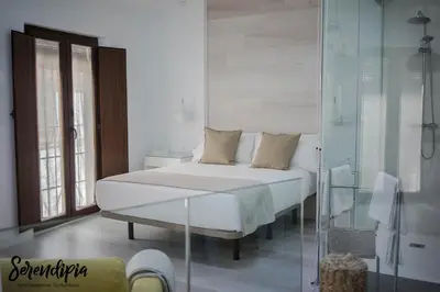 Cama o camas de una habitación en Serendipia San Justo
