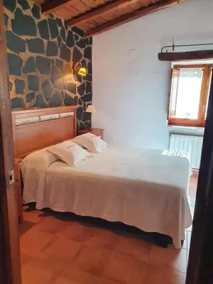 Cama o camas de una habitación en El Jiniebro Turismo Rural