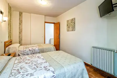 Cama o camas de una habitación en Pension La Playa