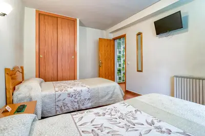 Cama o camas de una habitación en Pension La Playa