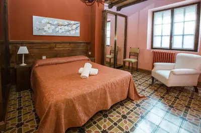 Cama o camas de una habitación en Apartamentos turisticos Avila Villa Carmen I
