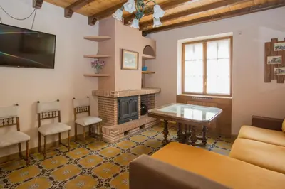 Una televisión o centro de entretenimiento en Apartamentos turisticos Avila Villa Carmen I