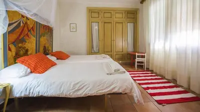 Cama o camas de una habitación en Casa Virgen del Carmen (VUT)