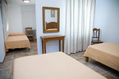 Cama o camas de una habitación en Hostal El Rincón