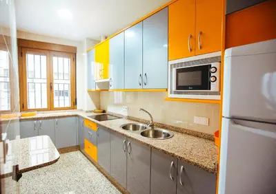 Una cocina o zona de cocina en Apartamentos Arcos