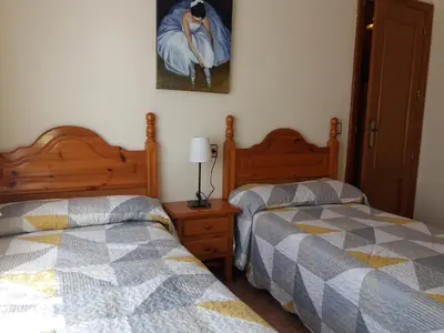 Cama o camas de una habitación en Casa El Reloj
