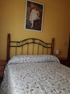Cama o camas de una habitación en Casa El Reloj