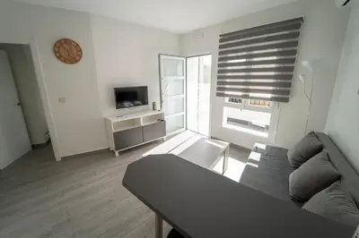 Una televisión o centro de entretenimiento en Apartamento San Miguel N.3