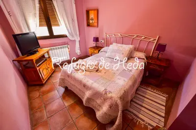 Cama o camas de una habitación en Casa Rural Refugio de Heda