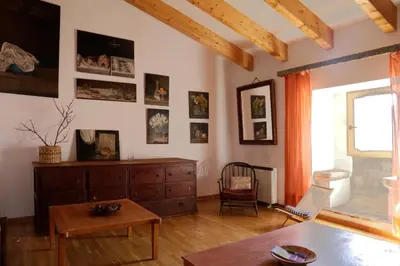 Una televisión o centro de entretenimiento en Apartamento en casa del s.XVI