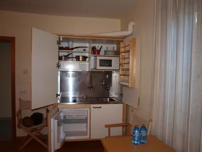 Una cocina o zona de cocina en Apartamentos Turísticos La Peña