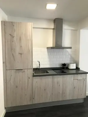 Una cocina o zona de cocina en Apartamentos Arriba by gaiarooms