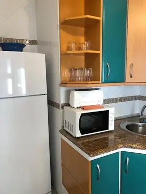 Una cocina o zona de cocina en Damas 3