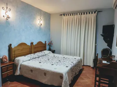 Cama o camas de una habitación en La Garzona