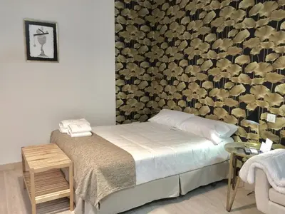 Cama o camas de una habitación en Puerta Trujillo