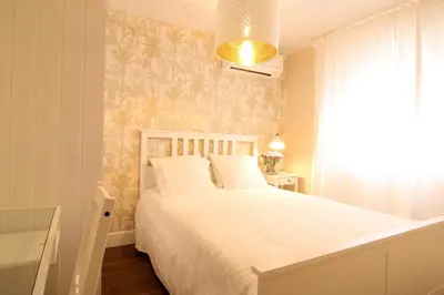 Cama o camas de una habitación en La Fonda de Candeleda