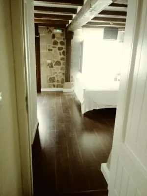 Cama o camas de una habitación en La Fonda de Candeleda