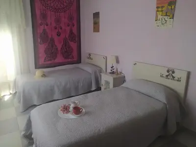 Cama o camas de una habitación en Apartamento Turístico La Ribera
