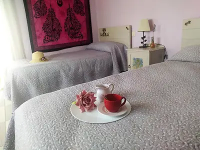 Cama o camas de una habitación en Apartamento Turístico La Ribera