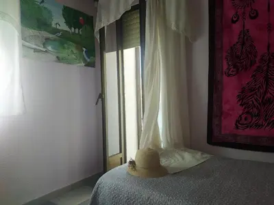 Cama o camas de una habitación en Apartamento Turístico La Ribera
