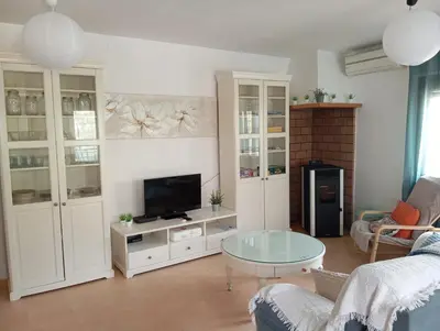 Una televisión o centro de entretenimiento en La Casa De Marta