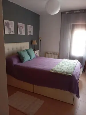 Cama o camas de una habitación en La Casa De Marta