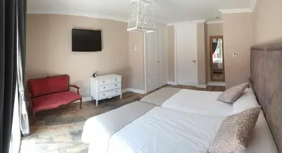 Cama o camas de una habitación en Casa Rural Rojo del Tietar
