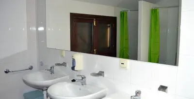 Un baño de Albergue Aurora Boreal