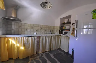 Una cocina o zona de cocina en Casa Rural El Abuelo Alonso