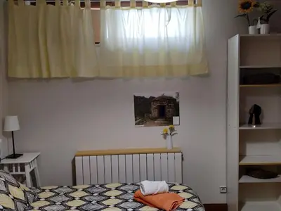 Cama o camas de una habitación en PEÑUELAS 7 Bajo